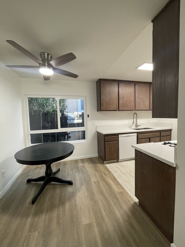 Dining room and kitchen - 11908 Riverside Dr Apartments Unit 4