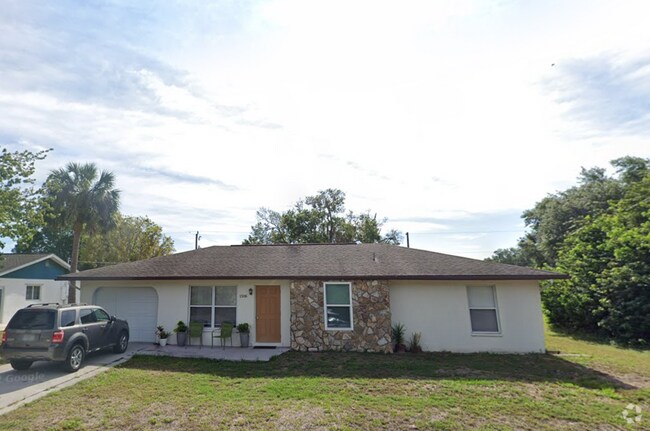 Building Photo - Charming 3BR/2BA Home with Screened Lanai ...