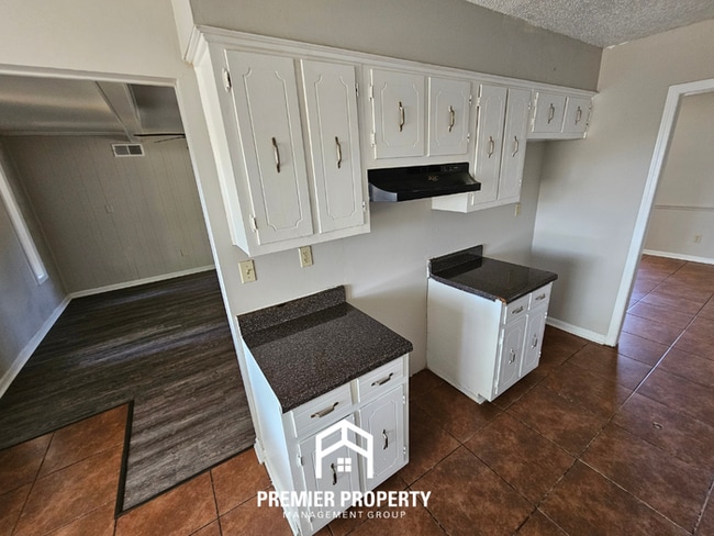 Photo - Spacious 4BR/2BA Home in 38115 | 2-Car Garage & Large Fenced Backyard