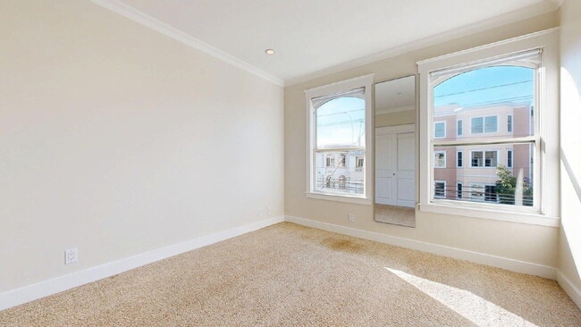 Building Photo - Bright & Modern 2BR/2BA Condo with Garage Parking & In-Unit Laundry – Central Richmond