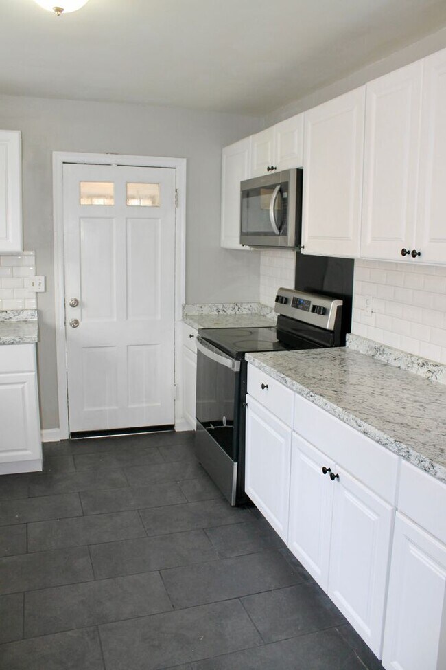 Photo - Luxurious Newly Renovated 3BR/2BA Haven with Private Parking - A Rare Market Gem