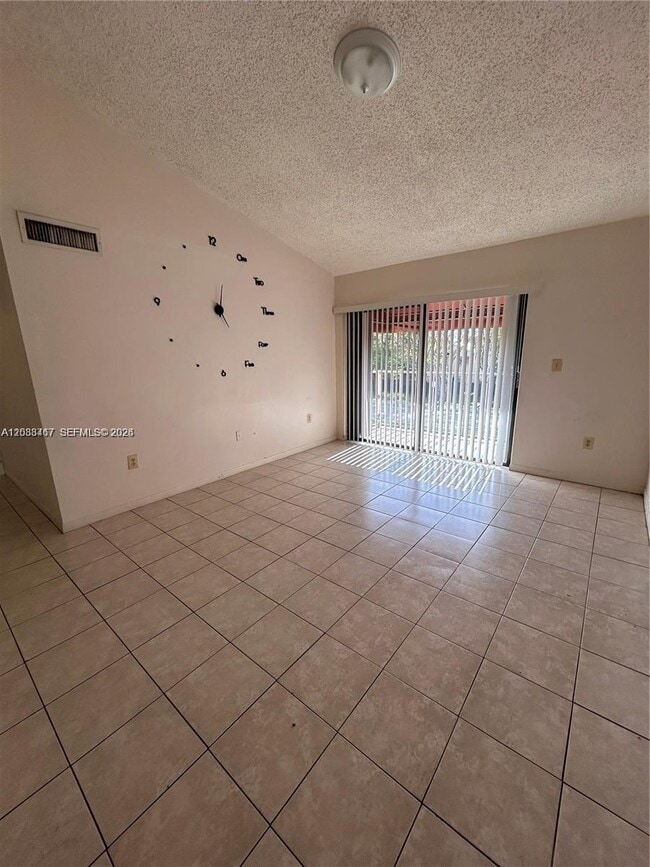 Building Photo - 15630 SW 80th St Unit I-305