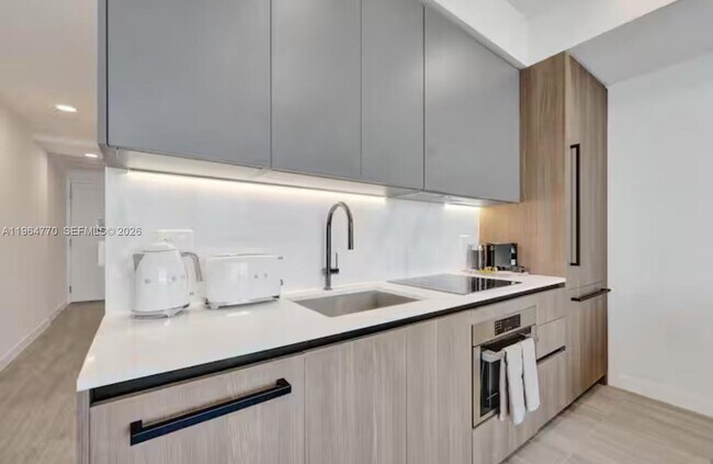 Photo - 580 72nd St Unidad 1713