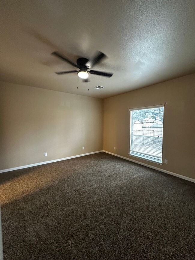 Photo - Spacious 5-Bedroom with Elegant Upgrades & Expansive Backyard in Trophy Ridge Subdivision