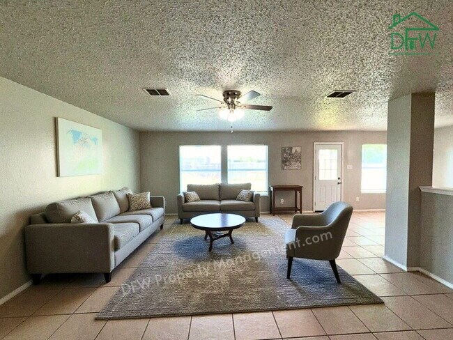 Photo - Spacious 4-Bedroom Home with Fireplace & Large Backyard in SW Fort Worth