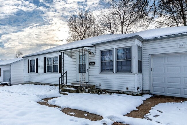 Photo - Charming 3-Bedroom Home with Garage, Basement & Fenced Backyard