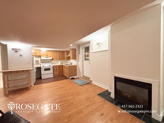Photo - Spacious 2-Bedroom Corner Basement Apartment with Fireplace & 2 Parking Spaces – Barrie Unit 2