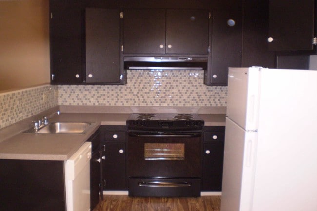 Una habitación, cocina - Leisure Terrace Apartments