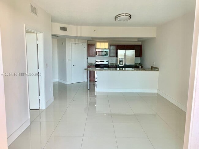 Building Photo - 7280 SW 90th St Unit 205
