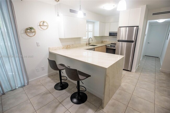 Photo - 777 NE 62nd St Unit C110