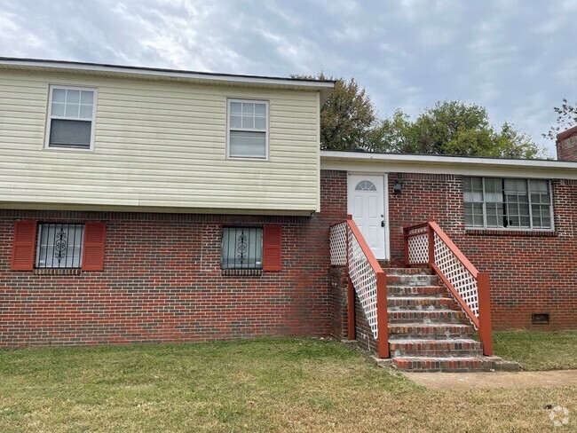 Building Photo - Four Bedroom - Two Bath Home