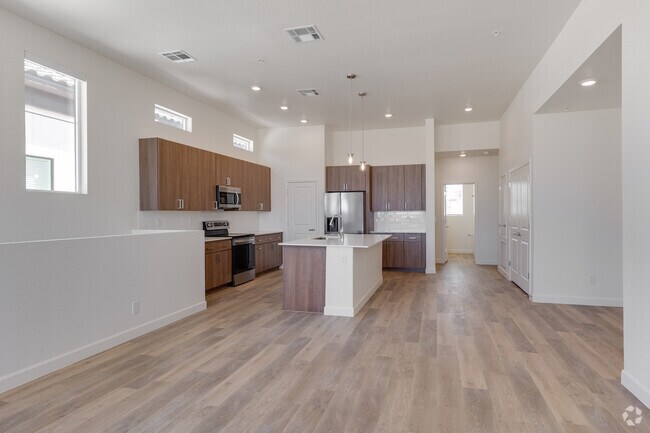 3BR, 2BA - 1,572SF - Living Room/Kitchen - Woodcrest at Power Ranch Apartments