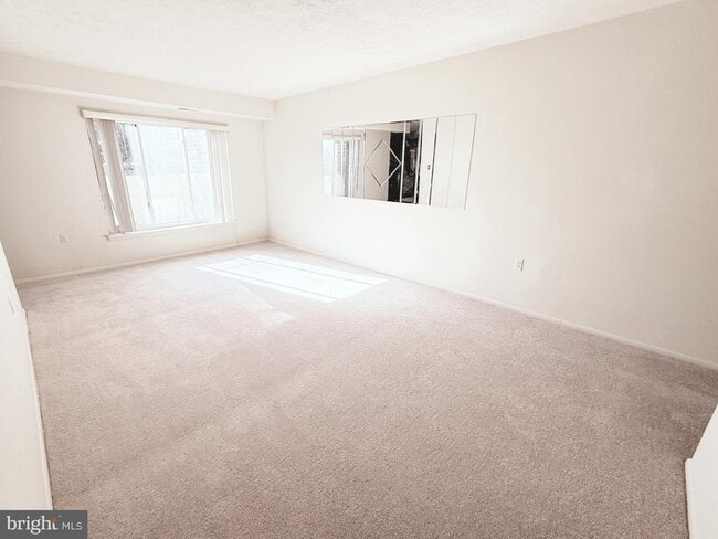 Building Photo - 7716 Hanover Pkwy Unit T-4