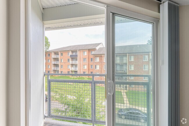 1BR, 1BA - 647SF - Bedroom Balcony - Bowen Flats