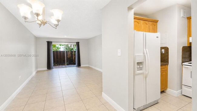 Building Photo - 9100 SW 137th Ter Unit 4-3