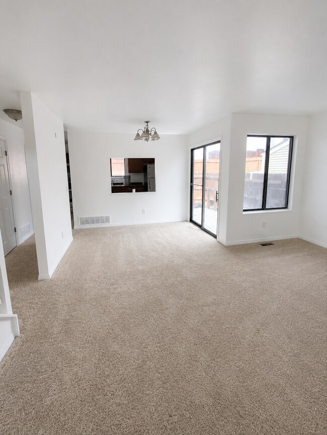 Convenient location, new paint & carpet throughout, enclosed patio.