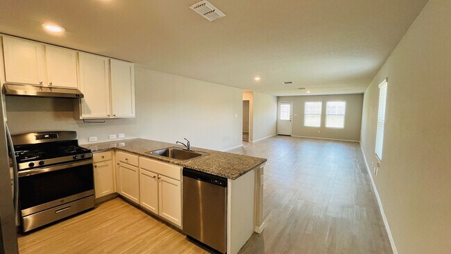 Photo - Spacious 4BR w/ Large Backyard – Close to ...