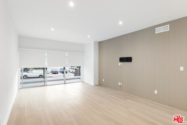 Building Photo - 10630 Wilkins Ave Unit 102