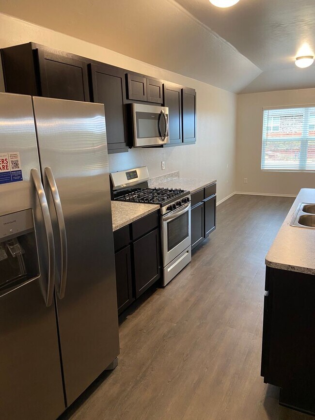 Photo - *Tax Relief Special!* Four Bedroom | Two B...