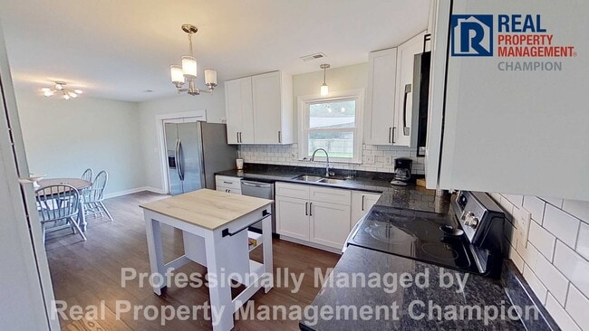 Photo - Furnished and Updated 4 BD/2.5 BA Home wit...