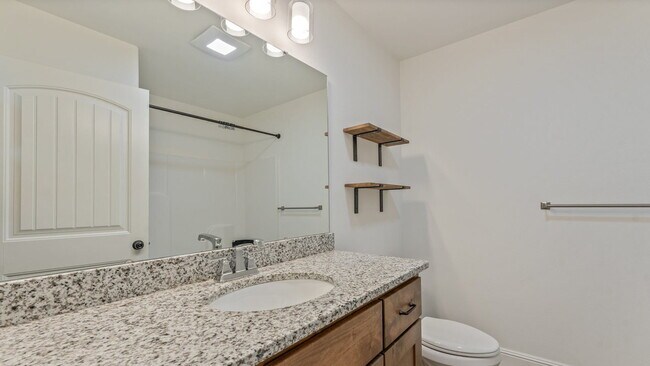 Photo - "Charming 3-Bed Oasis with Granite Touches & Cozy Fireplace in Bentonville!"