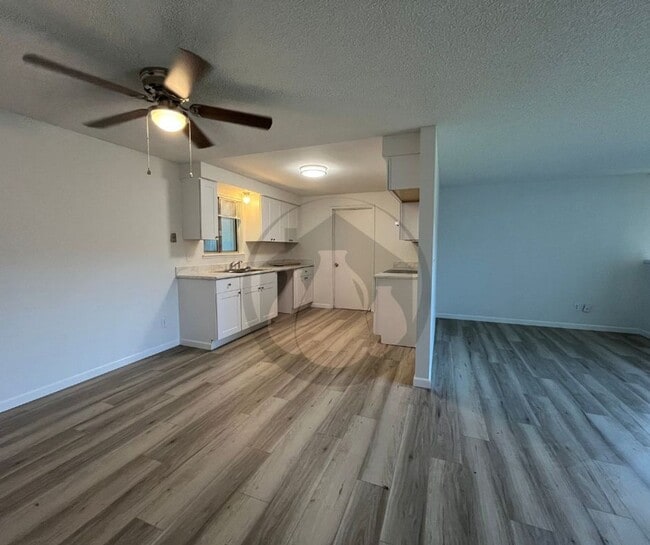 Photo - Single Level Triplex Ready to move In!