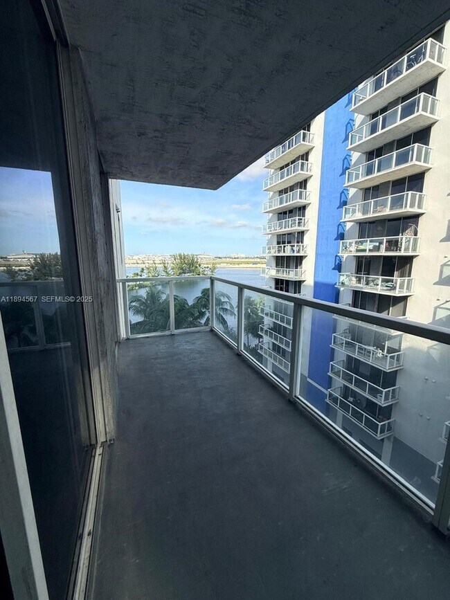 Building Photo - 5091 NW 7th St Unit 803