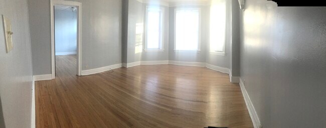 Building Photo - 5201 N Latrobe Ave Unit 1