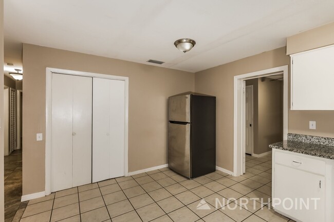 Photo - 4 BR/2.5BA | Newly Renovated Single Family Home | 1-Car Covered Parking | Fenced backyard!