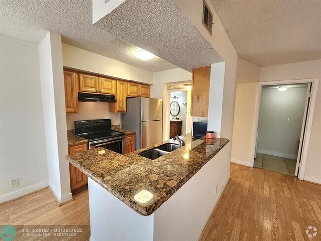 Building Photo - 5654 Rock Island Rd Unit 216 Rental