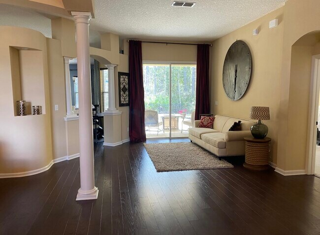 Beautiful foyer walks right out to relaxing patio with private preservation views - 4294 Eagle Landing Pky House