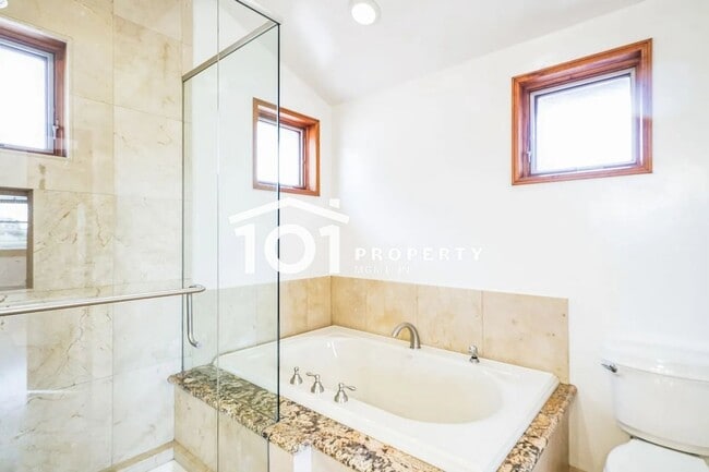 Photo - Spacious 4-Bedroom Home with 3 Bathrooms and a 2-Car Garage