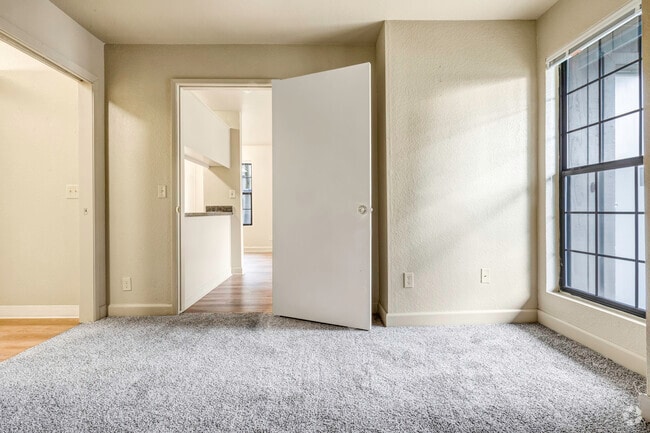 View of bedroom towards kitchen
