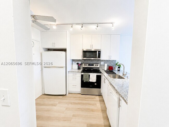 Photo - 8233 Harding Ave Unit 703
