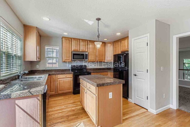 Photo - 8210 E 29th Ave
