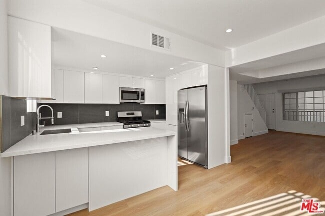 Building Photo - 1623 Brockton Ave Unit 5 Rental