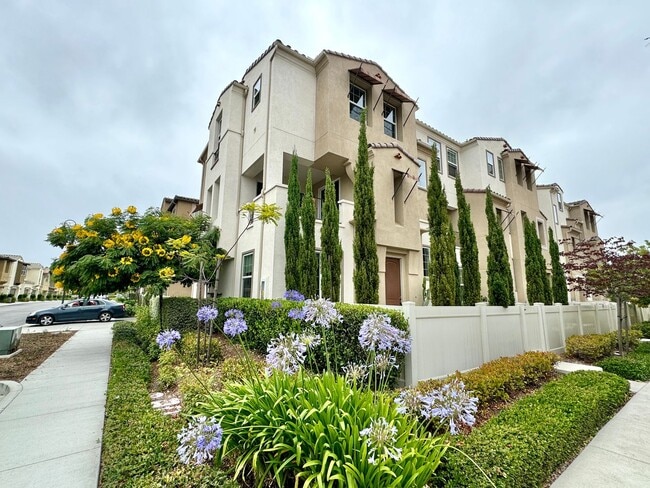 Building Photo - Spacious 4BD/3.5BA Townhome in Oceanside with Community Pool, 2-Car Garage & Covered Balcony