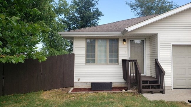 Front exterior and covered entry - 2977 West Village Lane