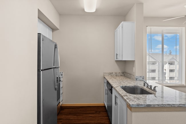 A sleek kitchen with updated finishes and bright natural light.