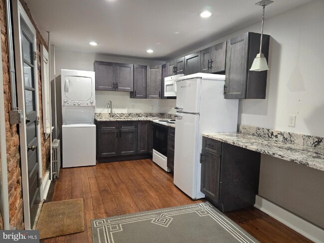 Photo - "Charming 1-Bed Rowhouse with Granite Elegance & Hardwood Warmth in Frederick!"