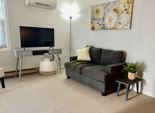 Living room with TV/wifi - 2840 Hollymead Dr Unit B