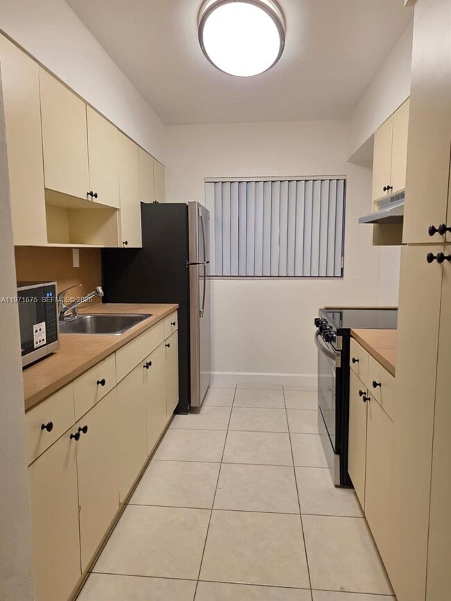 Photo - 9490 E Bay Harbor Dr Unidad 102