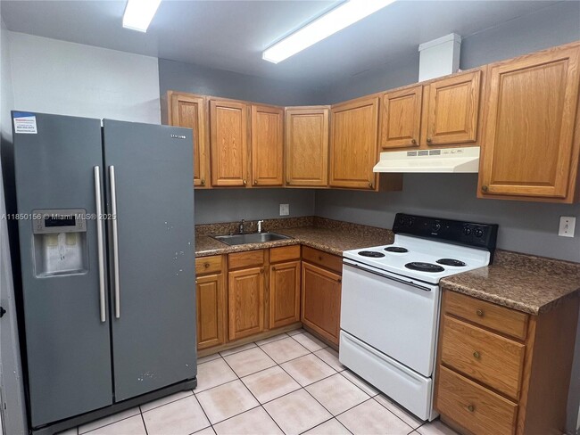 Building Photo - 9203 NW 38th Dr Unit 12 Rental