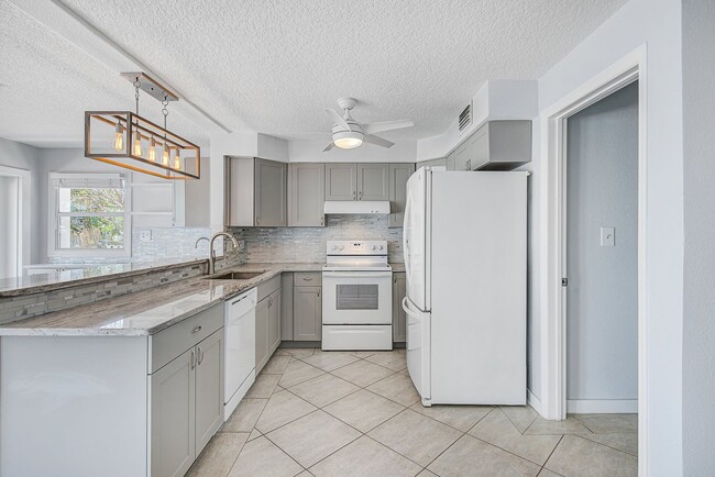 Photo - 3/2 Just Steps to the Intercoastal with Boat Ramp and Dock