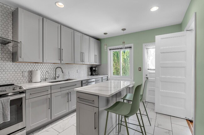 Photo - Furnished 4-Bedroom Home with a Private Pool near Elmwood Village