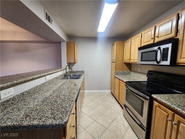 Building Photo - 5055 W Hacienda Ave Unit 1183