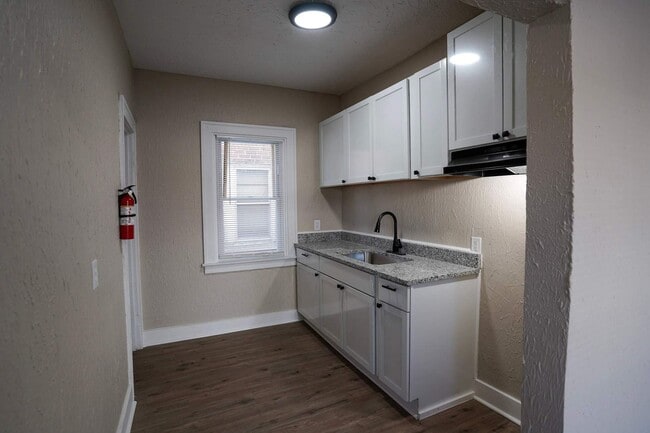 Photo - This beautifully updated 5-bedroom, 1-bath single-family home is ready for move-in!