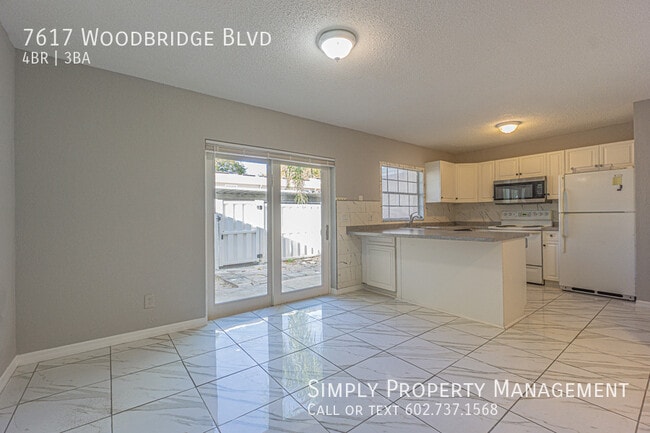 Photo - 7617 Woodbridge Blvd