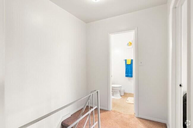 2BR, 1BA - 842SF - Upstairs Hallway - Paradise At Parkside Apartments