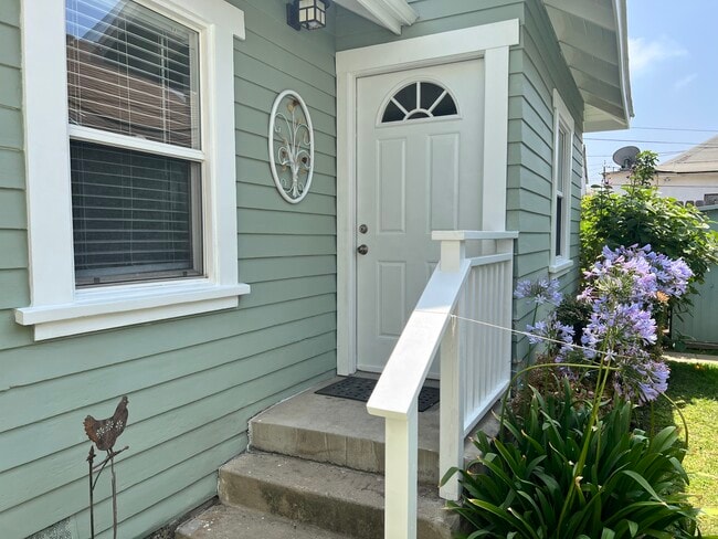 Small standalone cottage front door - 1819 10th St House